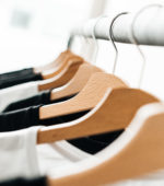 wooden hangers on a wire rack