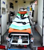 empty gurney sits in an ambulance