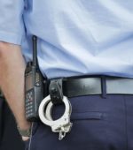 handcuffs on a police officer's belt